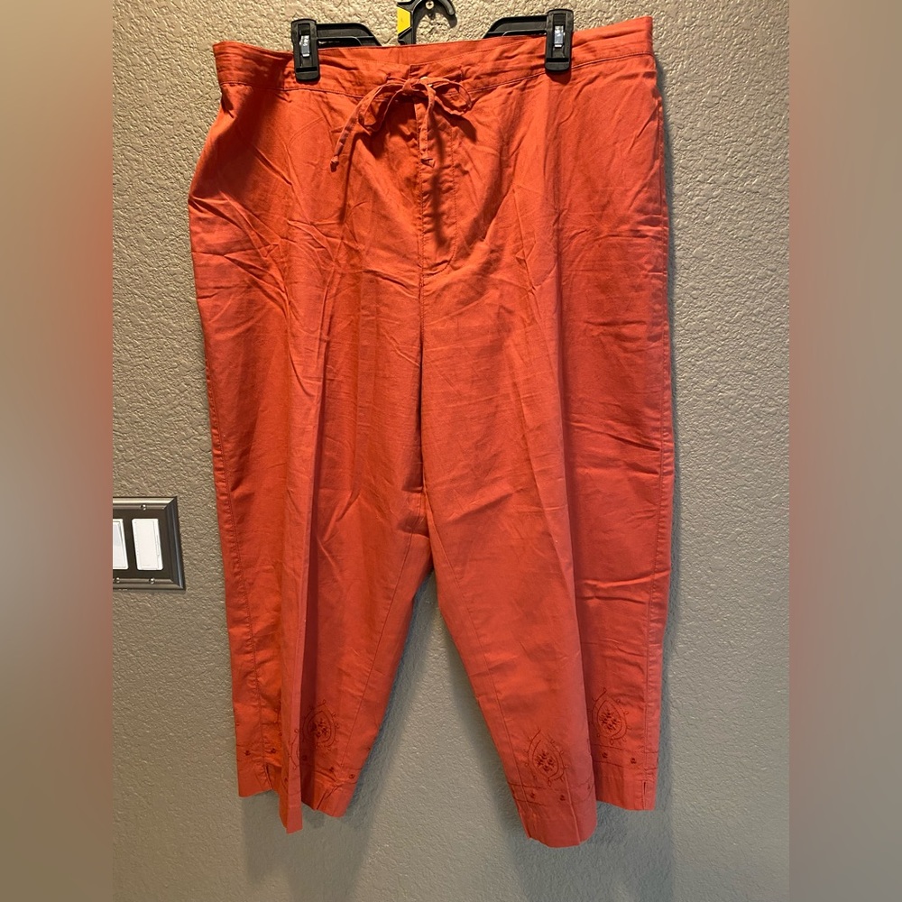White stag women’s rust Capri with embroidered embellishments on legs